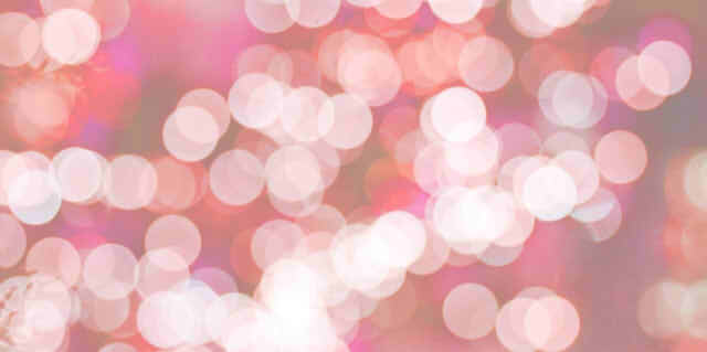 ピンクがかった煌めくライトの画像